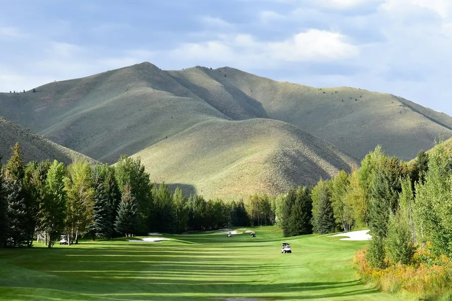 A view of a Sun Valley golf course with mountains in the background